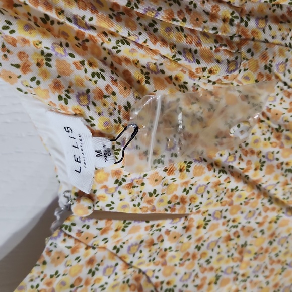 Adorable floral yellow dress with adjustable tie straps and zipper - Picture 4 of 8